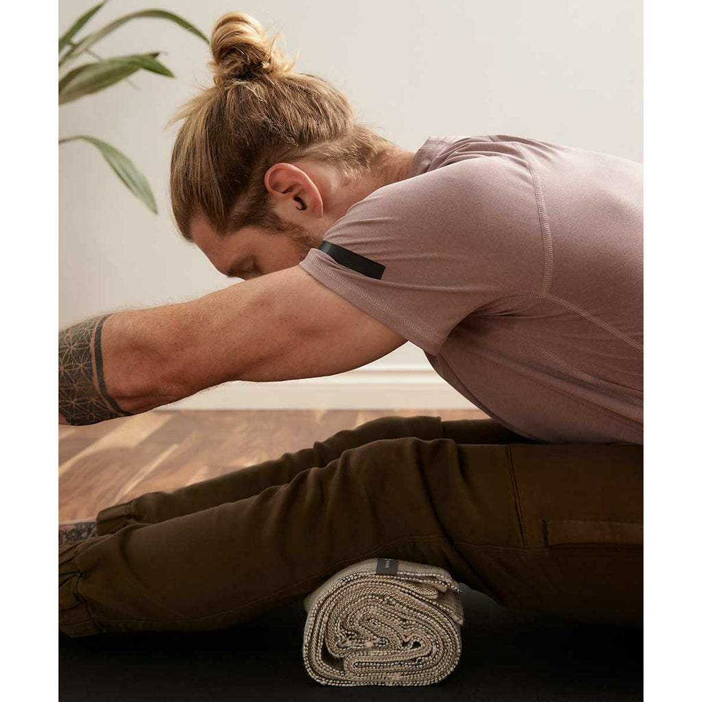 Halfmoon Melange Yoga Blanket, in rose, in use.
