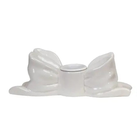 Three decorative bows in white, red, and pink on a white background