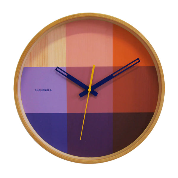Cloudnola Riso Wall Clock in red and blue.