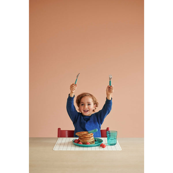 Mio Children's 3 Piece Cutlery set, in use.