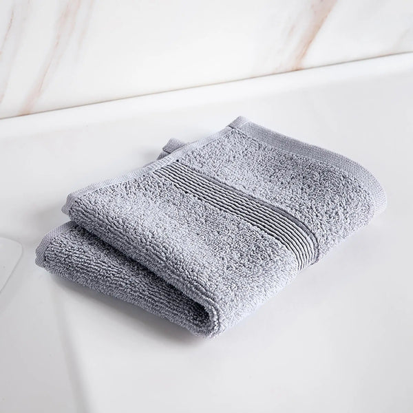 Moda At Home Allure Cotton Face Towel, in marble grey.