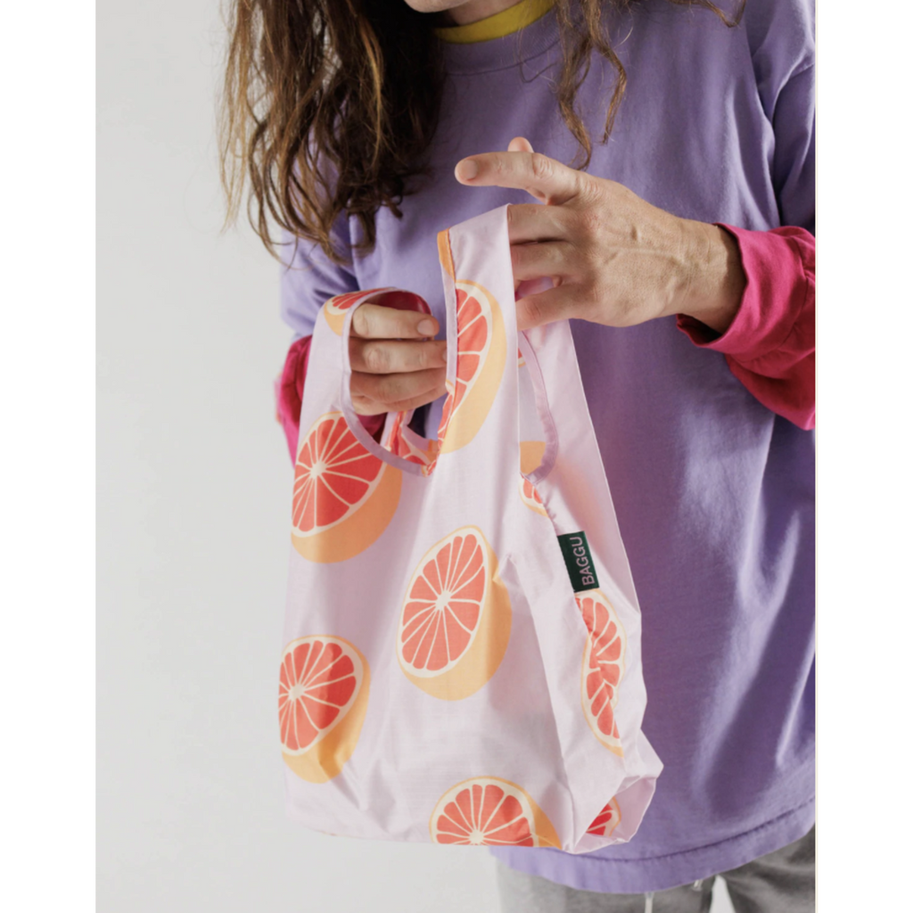 Baby Baggu Grapefruit Bag, in use.