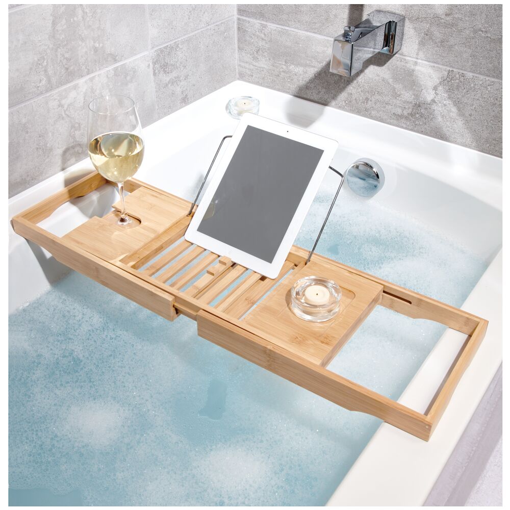 IDesign Bathtub Caddy in wood, in use with tablet, wine, and candle.