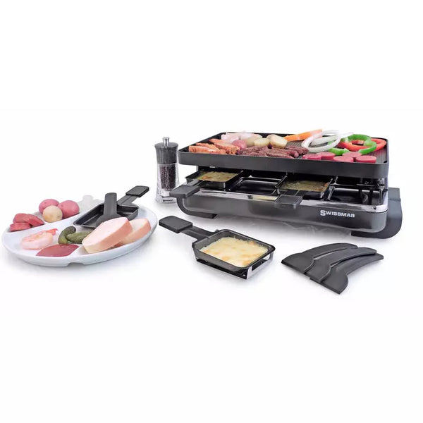 Swissmar Aluminium Non-Stick Raclette, in use with veggies and cheese.