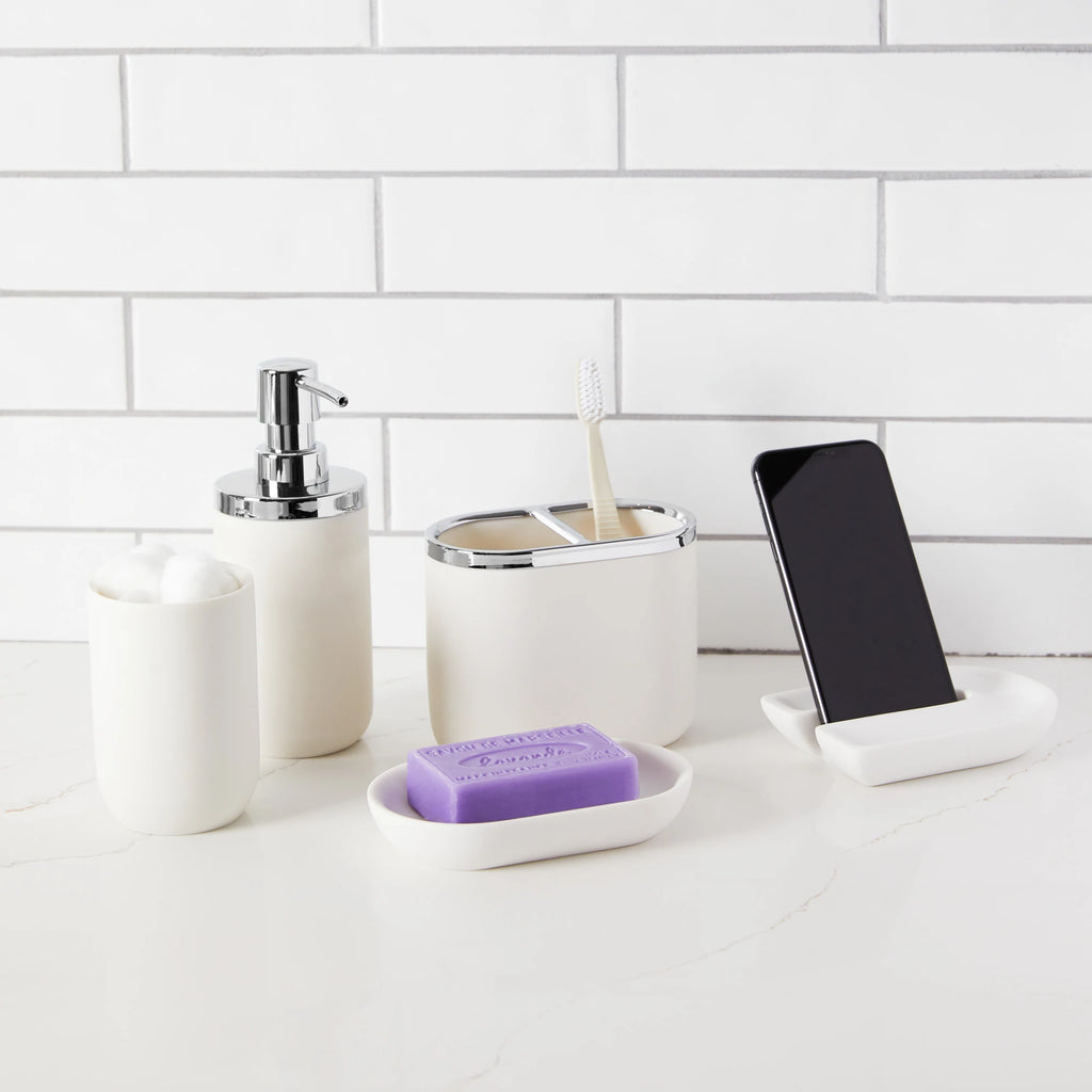 Umbra Junip Soap Dish in white, with full set, styled in bathroom.